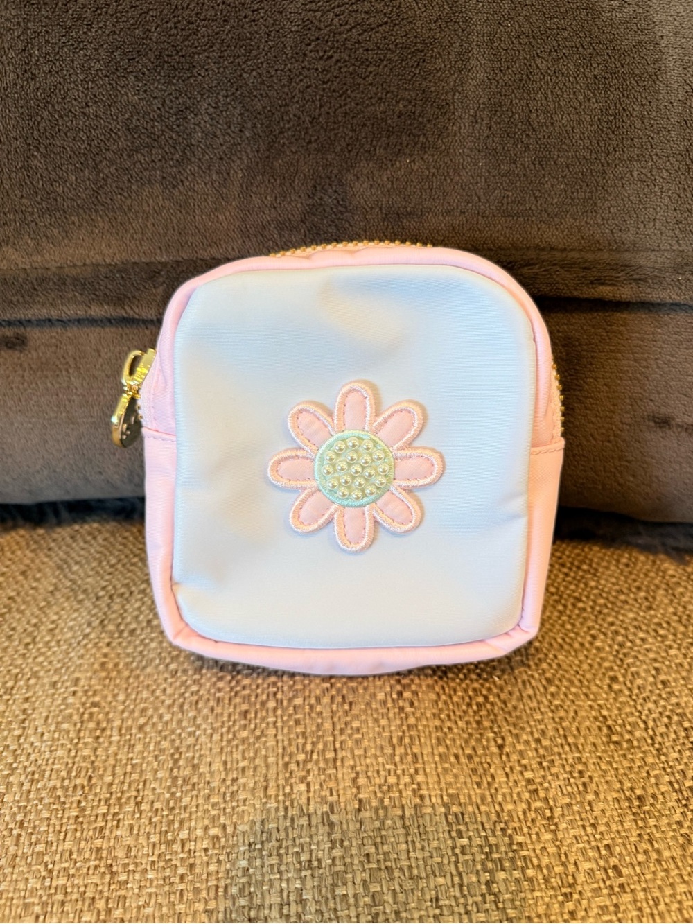 Stoney clover lane pastel mini pouch with flower sewn on.